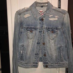 American Eagle jean jacket with pattern on back